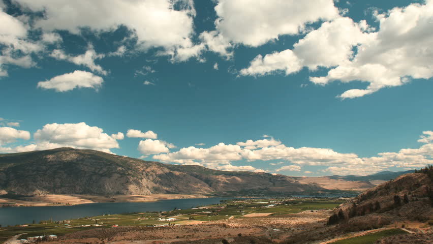 Osoyoos Valley and Lake Timelapse, British Columbia. Timelapse view of Osoyoos Lake and the Town of Osoyoos in the Southern Okanagan Valley. British Columbia, Canada.
