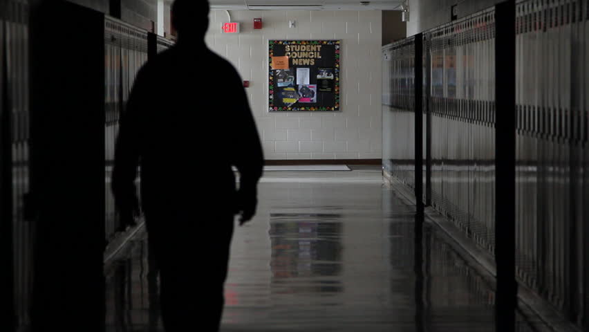 Shot of a school hallway with metal lockers