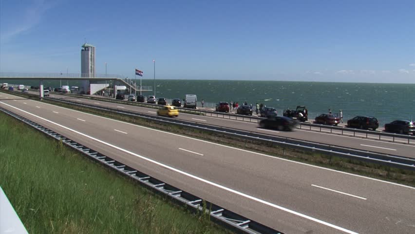 Afsluitdijk (enclosure dam) in The Netherlands,  Ijsselmeer in background. Dudok monument marking the spot where the Enclosure dam had been closed.