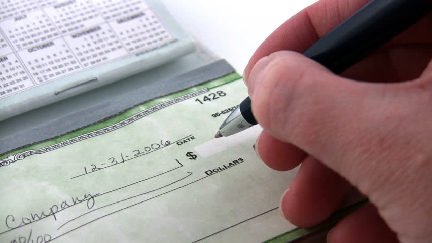 Writing a check.