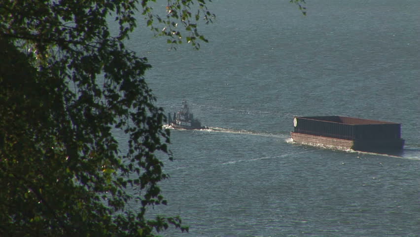 Tugboat on the Columbia river towing barge
