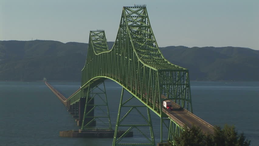 Close up of Astoria bridge with trucks and cars, OR