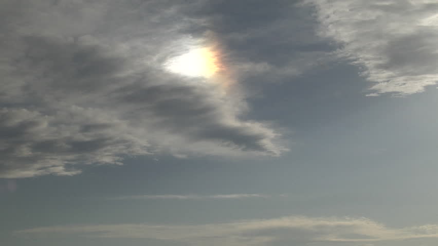 Sun Dog. This dog don't bite...it's a portion of a parhelic circle in icy cirrus clouds