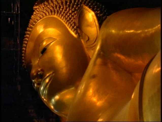 Temple of the Reclining Buddha, The Golden Buddha, close up face of gold