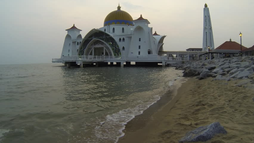 Time lapse with zoom  at sunset of Selat Mosque in Malacca island Malaysia also known as Malacca Straits mosque