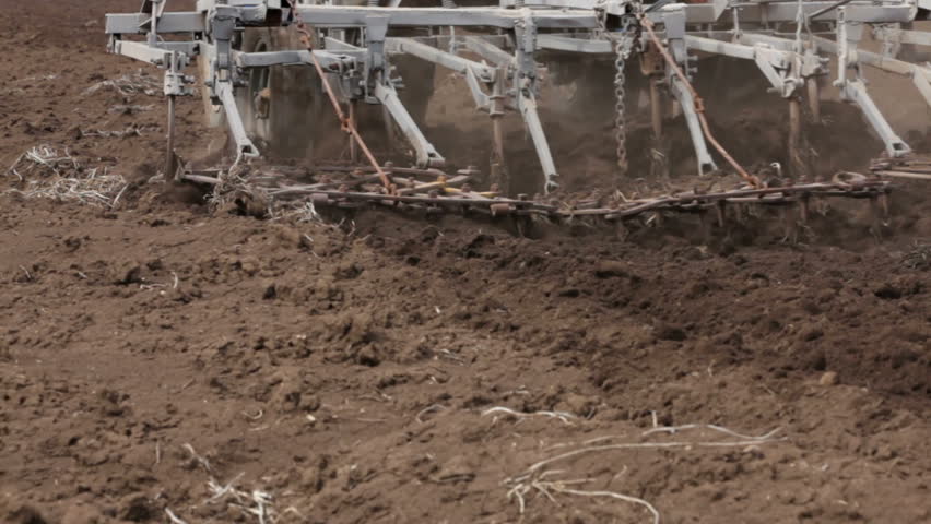 Shot of tractor plowing field.