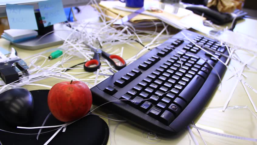Chaotic office, bad worker, mess and all sorts of supplies.
