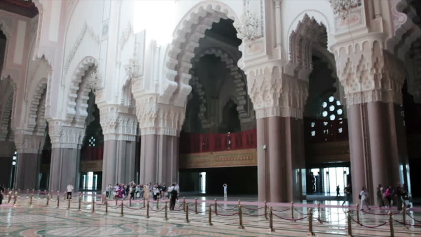 CASABLANCA, MOROCCO - OCT 16: Prayers and tourists sightseeing the interior of the Mosque Hassan II on October 16, 2010 in Casablanca, Morocco. Automatic aperture change on this shoot.
