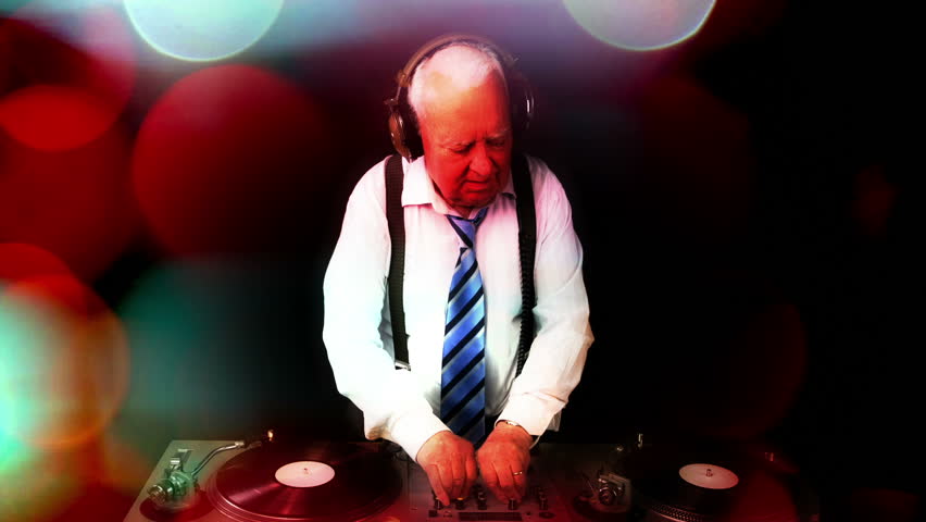 a very funky elderly grandpa dj mixing records
