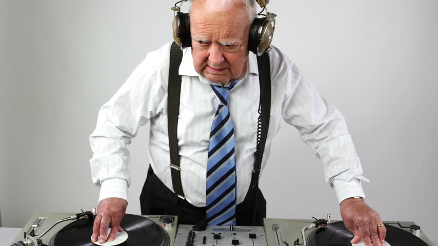 a very funky elderly grandpa dj mixing records
