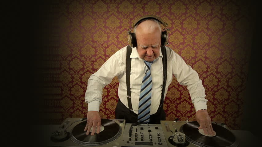 a very funky elderly grandpa dj mixing records
