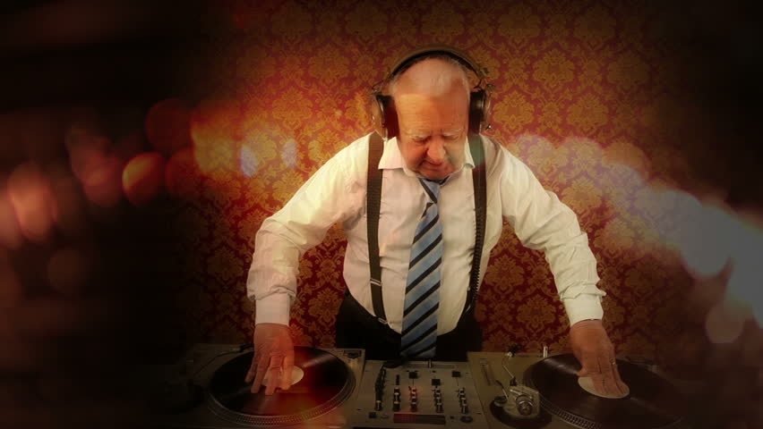 a very funky elderly grandpa dj mixing records
