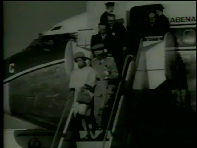 King Baudouin and Queen Fabiola of Belgium are greeted by Emperor Hirohito and Crown Prince Akihito at the airport, Tokyo circa 1964-MGM PICTURES, UNIVERSAL-INTERNATIONAL NEWSREEL,USA, filmed in 1964