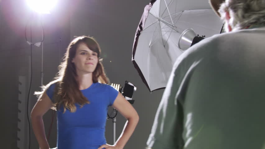 Photographer takes pictures of actress/model in studio. Deliberately edgy, hand-held camera. Edited sequence with some effects added.