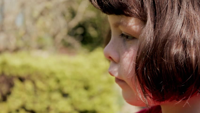 Child using asthma inhaler