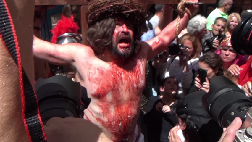 JERUSALEM-MARCH 29: Catholic Holy Friday - a group of actors depicting the crucifixion of Christ near Holy Sepulcher in Old City Jerusalem, Holy Friday March 29, 2013 in Jerusalem, Israel