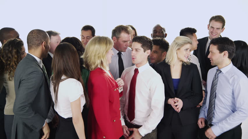 Portrait of a large group of happy and diverse business people who are standing together, isolated on white in a studio shot. They smile at the camera and applaud their business success.