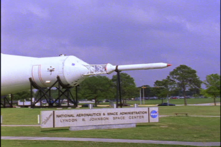 JOHNSON SPACE CENTER, HOUSTON, TEXAS - APRIL 28, 1999: Tracking shot past retired Saturn rockets, on display in sections.