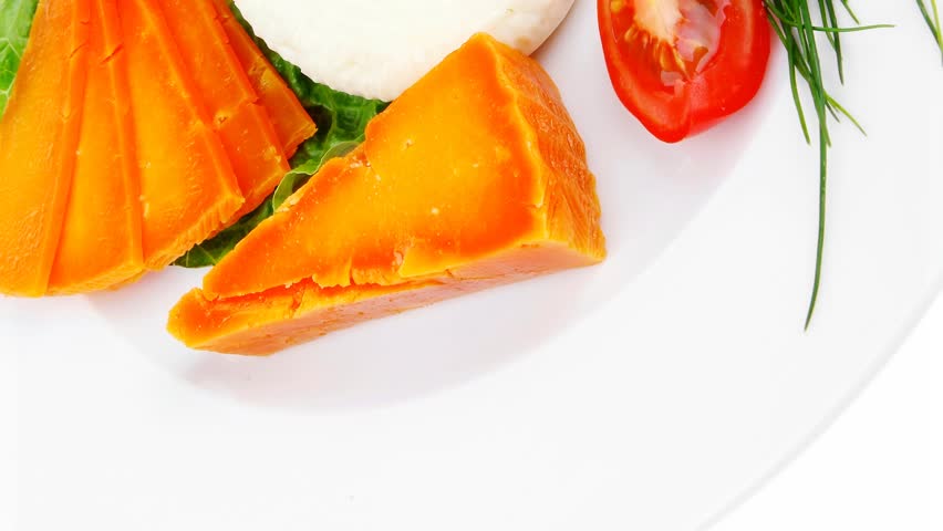 fresh aged cheese : parmesan roquefort and gruyere with soft feta on plate 
