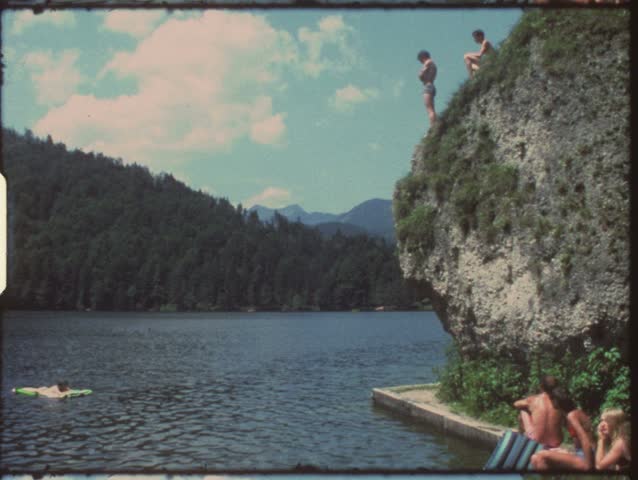 Vintage 8mm film: Children jumping in lake