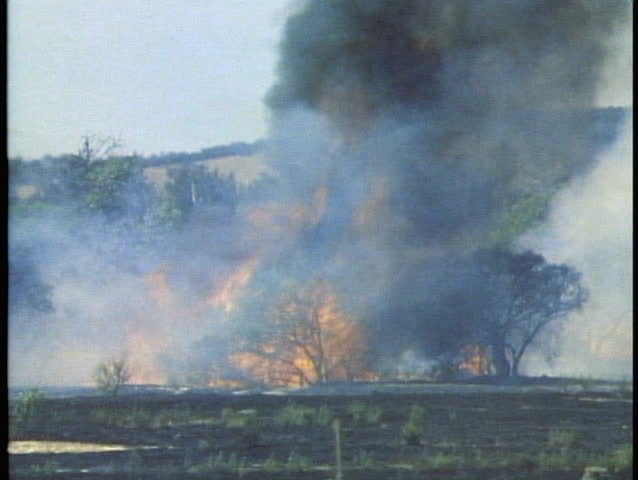 Brush fire of the outback, close up jeep, fire raging, Western Australia