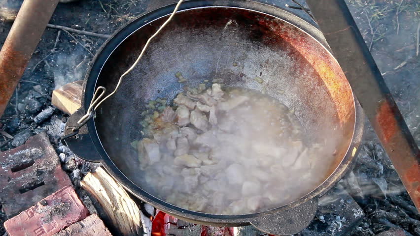 Cooking pilaf. Add the carrots 