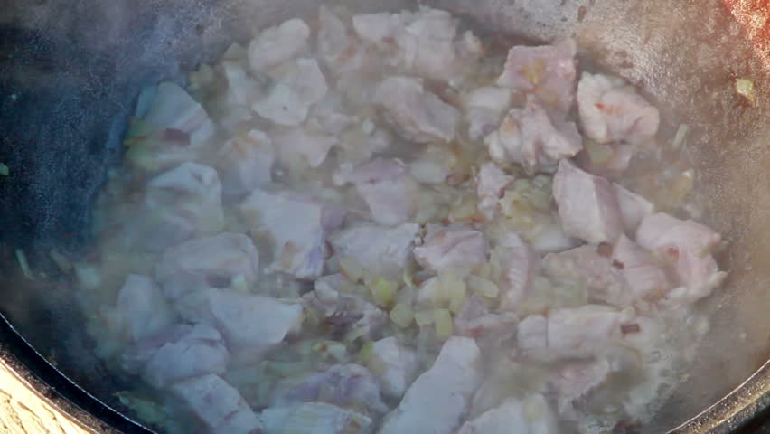 Cooking pilaf. Stewed meat 