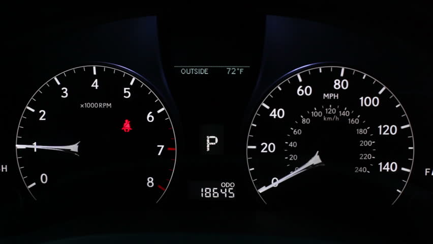 Close-up of car dashboard at night