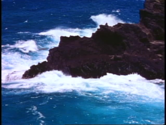 Hawaii, Island of Oahu cliffs and sea, rugged and jagged, down into the sea