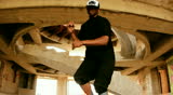 cool Hip-hop dance black dancer young male dancing breakdance in building with graffiti wall background