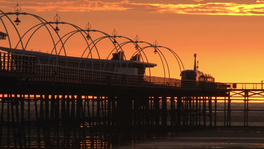 A pier in a glorious western sunset.