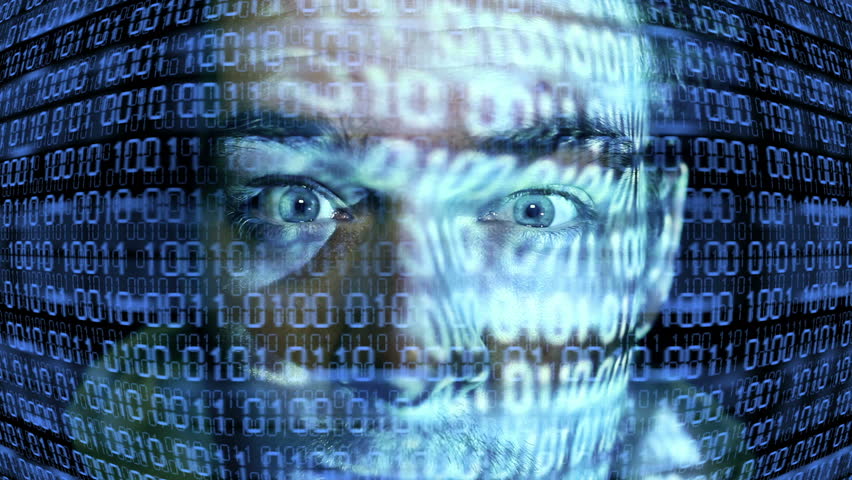 ID theft looking at the camera with binary codes reflections
