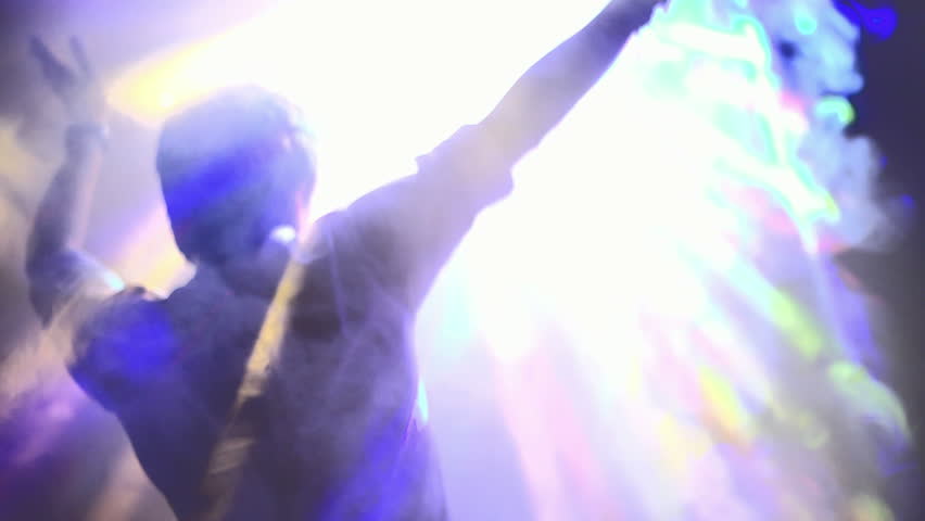 Dancing silhouette of man in a nightclub