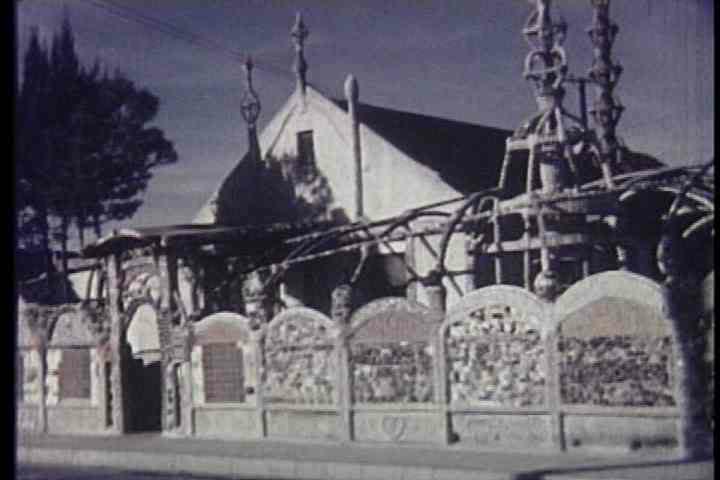 1950s - Simon Rodilla works on the Watts Towers in 1957.