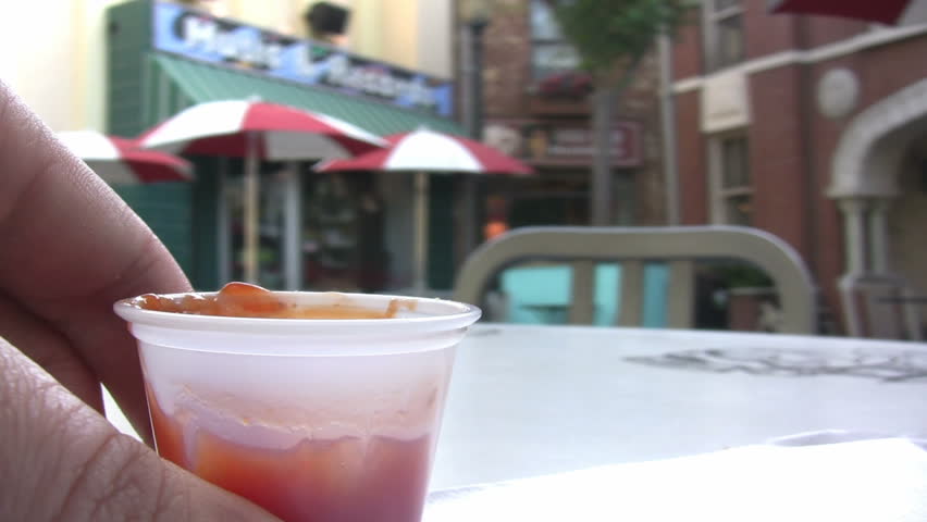 Dipping Fries into Ketchup