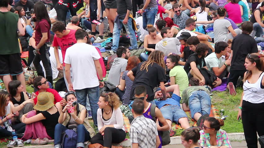 ROME, ITALY - MAY 1: People during free "Concerto del Primo Maggio" ("Workers' Day Concert") in Piazza San Giovanni (San Giovanni Square) on Workers' Day, May 1, 2013 in Rome, Italy.