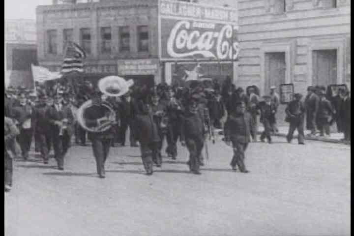 1910s - 1917 Communist parade down a city street.