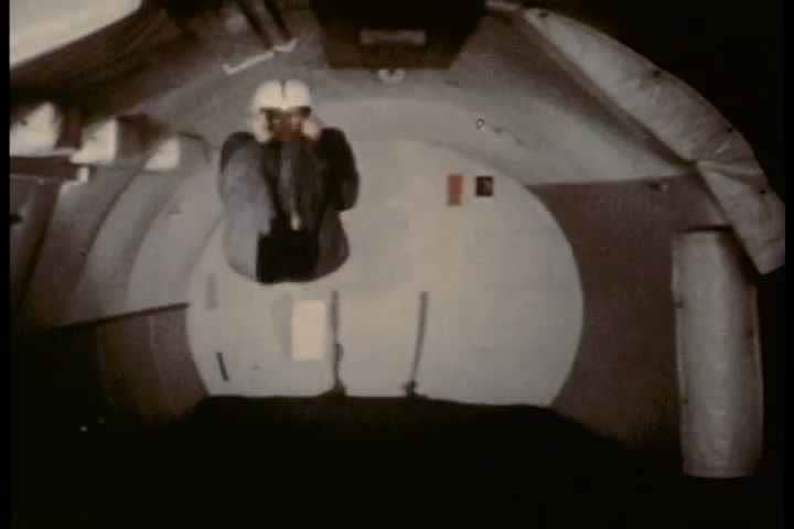 1960s - An astronaut spins at zero gravity.