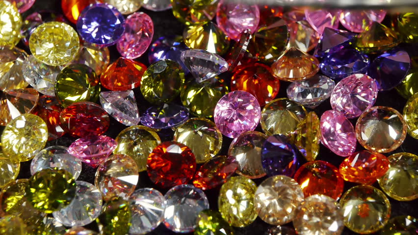 Selecting Pink Cubic Zirconia Fantasy Gemstone.
