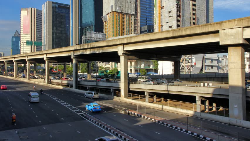 Traffic in the city. There are several freeway lane.