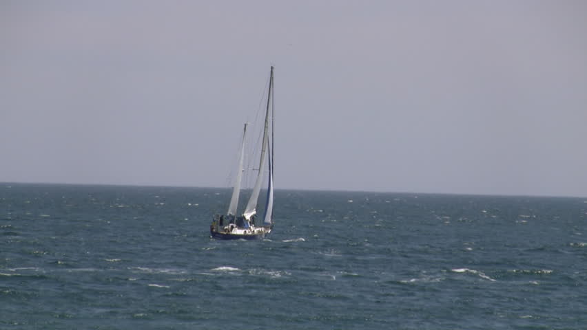 Sailing yacht in sea. 