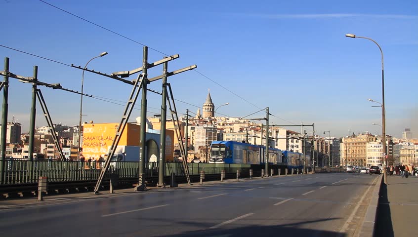 ISTANBUL - FEB 11: Traffic on Galata Bridge on February 11, 2011 in Istanbul, Turkey. It is a bascule bridge which is 490 m long and connects Karakoy Region to Old City.