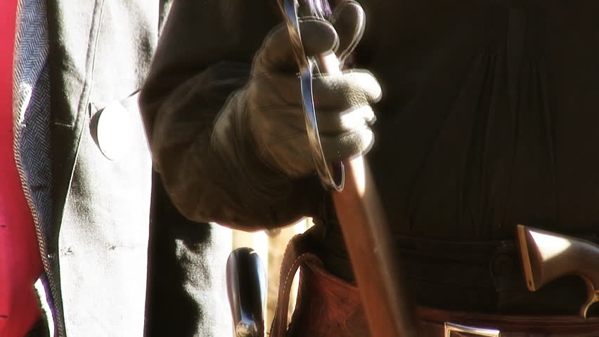 cowboy cocking a rifle