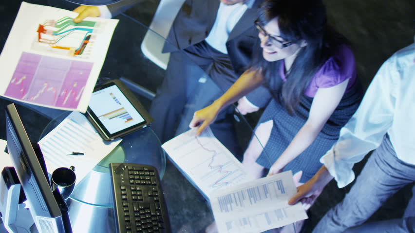 Creative business team working late at night. 