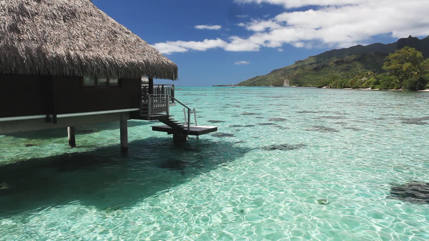 Over water bungalow with steps into amazing lagoon