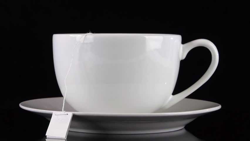 Download Front View Of Black Coffee Being Poured Into A White Cafe ... Yellowimages Mockups