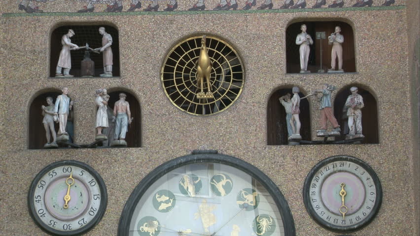 OLOMOUC - JUNE 1, 2009: Only once a day at high noon you can see performance of figures on City Hall astronomical clock in Olomouc, Moravia, Czech Republic.