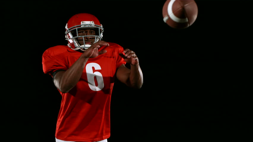 Portrait Of Football Player On Black Background Stock Footage Video