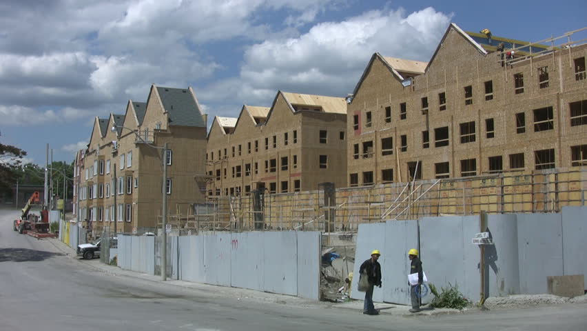 TORONTO - JUNE 9: Home construction and workers in Toronto, Canada, June 9, 2009. The annual rate of Canadian housing starts increased to 140,700 units in June up from 130,300 in May.