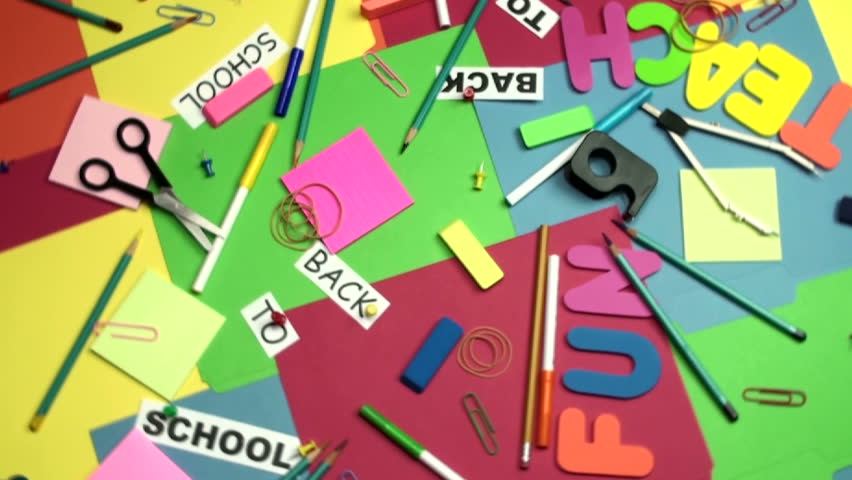 1920x1080 Rotating display of colorful school supplies.